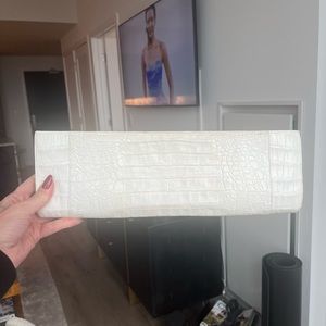 White crocodile Nancy Gonzalez clutch.
